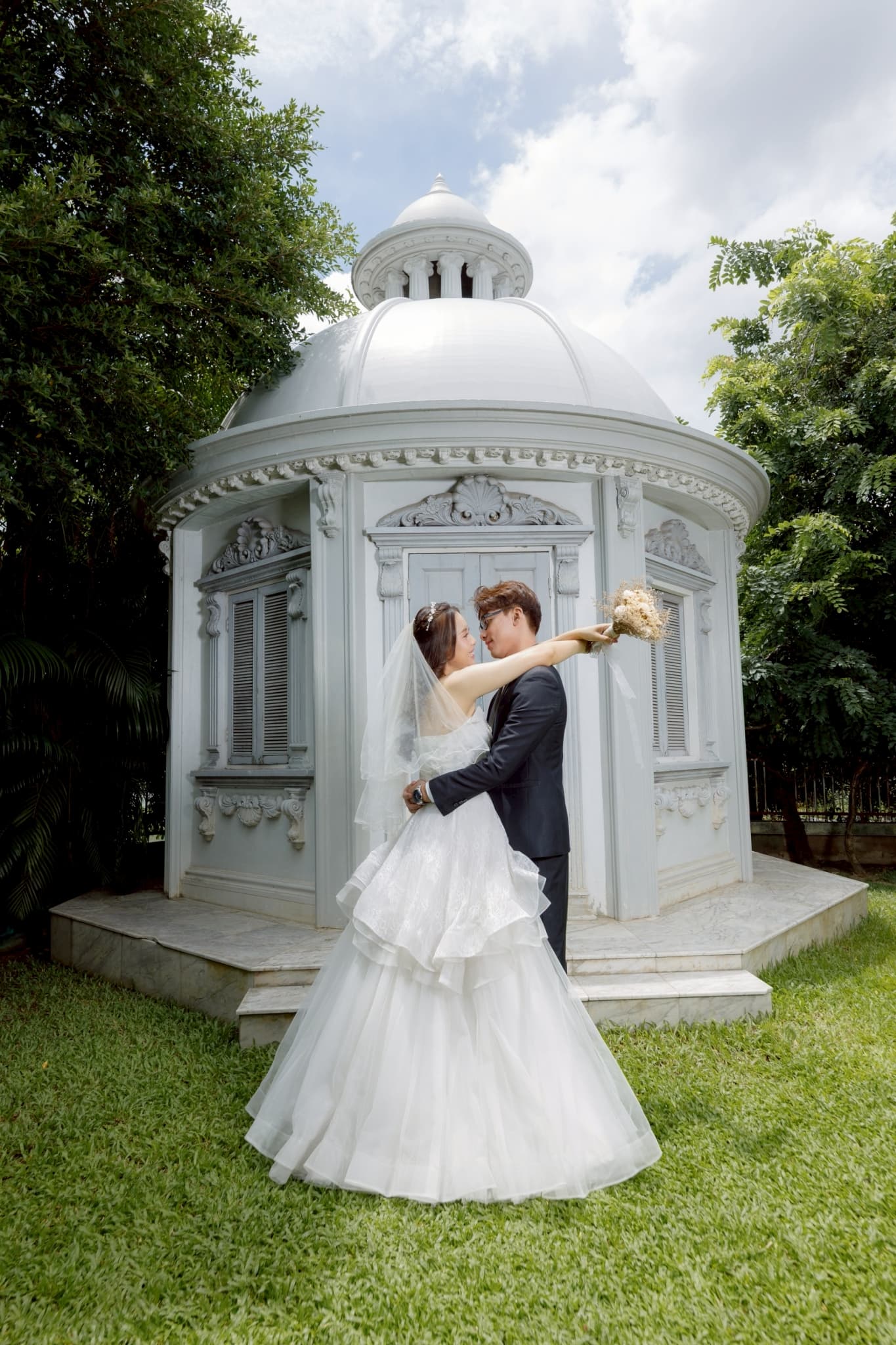 Wedding venue setup with white chairs